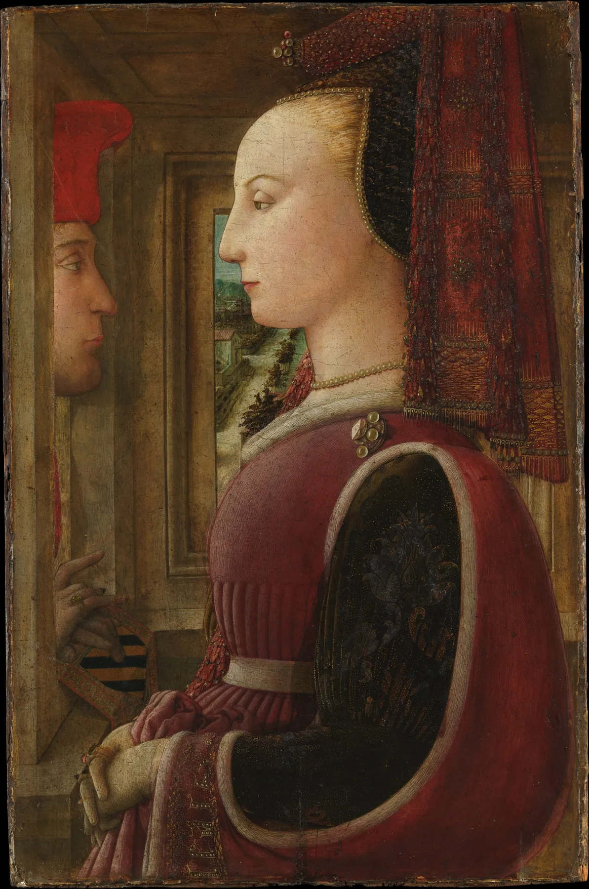 Retrato de una mujer con un hombre en una ventana, de Fra Filippo Lippi