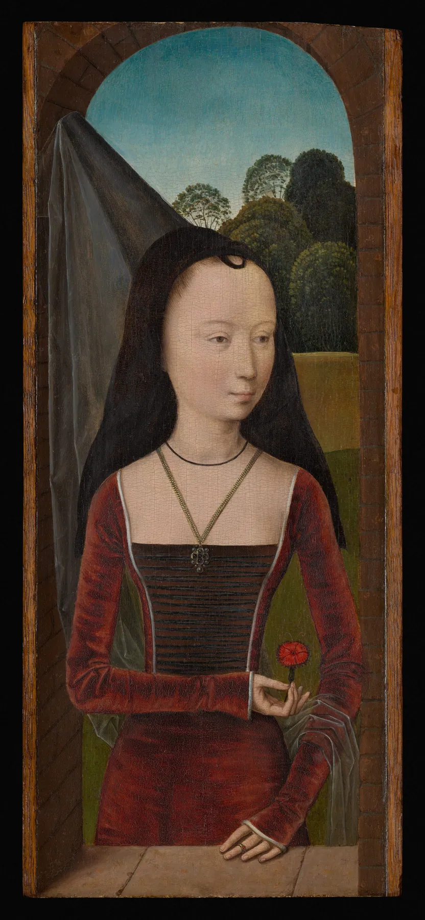 Joven con un clavel, de Hans Memling